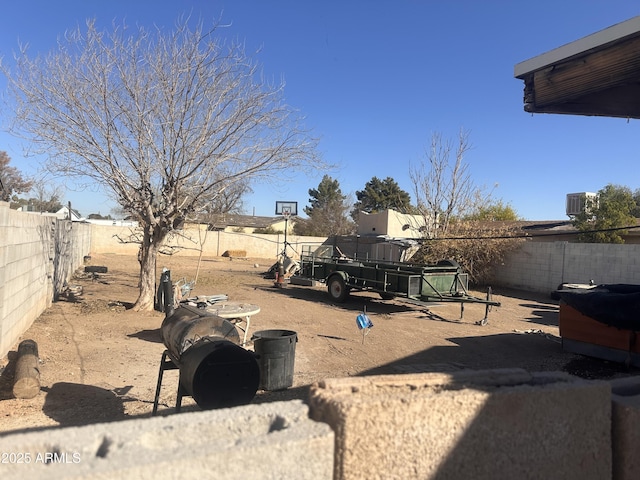 view of yard with central air condition unit