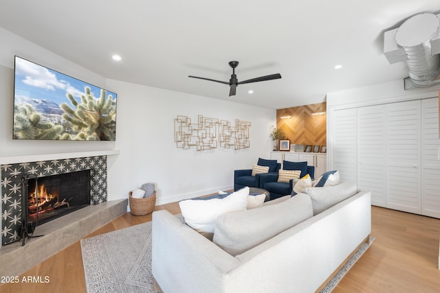 8001 N 3rd Pl, Phoenix, AZ 85020 - living area featuring ceiling fan, a high end fireplace, recessed lighting, and wood finished floors
