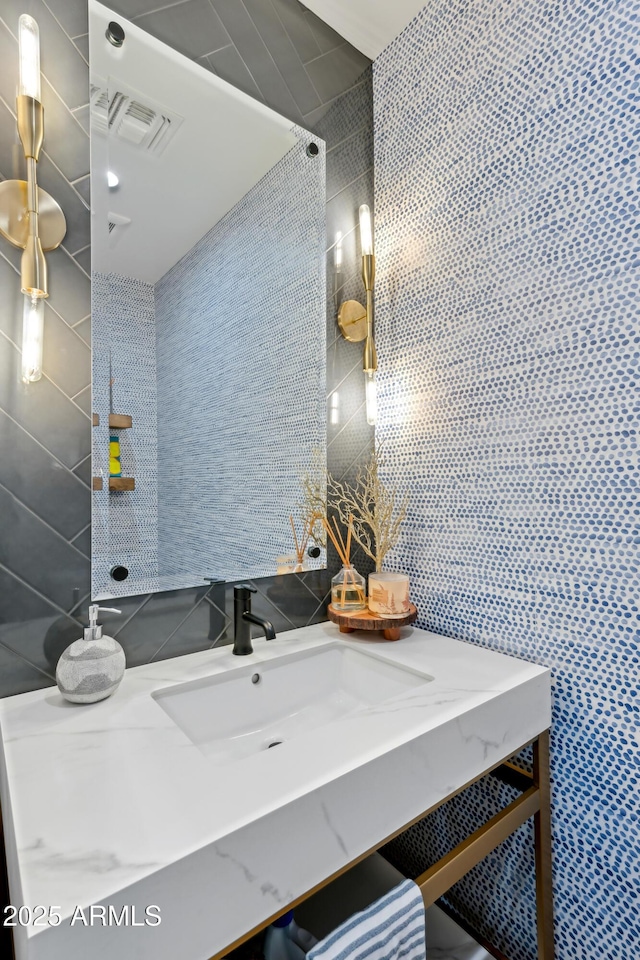 8001 N 3rd Pl, Phoenix, AZ 85020 - bathroom with tile walls and vanity