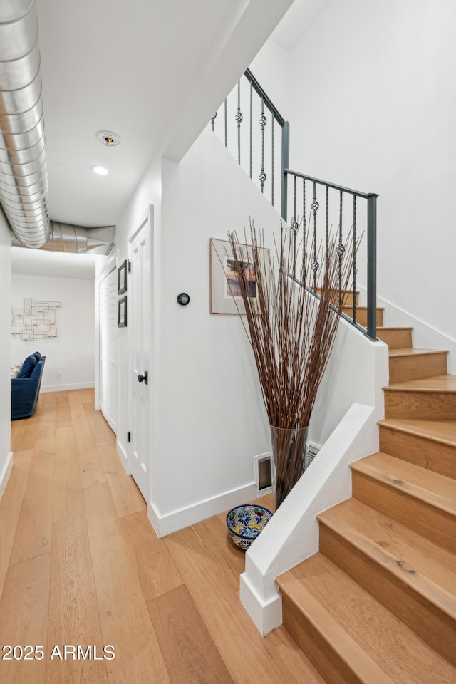8001 N 3rd Pl, Phoenix, AZ 85020 - hallway featuring stairway, light wood-style floors, baseboards, and recessed lighting
