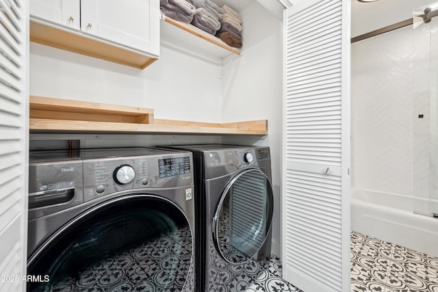 8001 N 3rd Pl, Phoenix, AZ 85020 - laundry room with separate washer and dryer, cabinet space, and tile patterned flooring