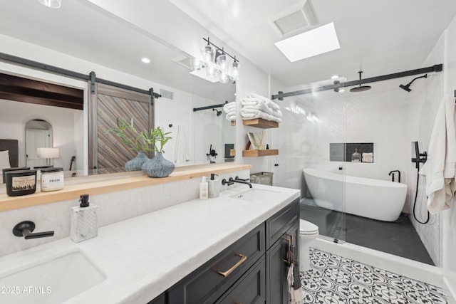 8001 N 3rd Pl, Phoenix, AZ 85020 - bathroom featuring double vanity, a stall shower, and a freestanding tub