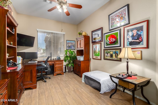 office space with light wood-type flooring and ceiling fan