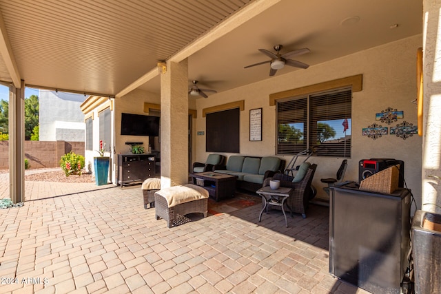 view of patio / terrace featuring ceiling fan and outdoor lounge area