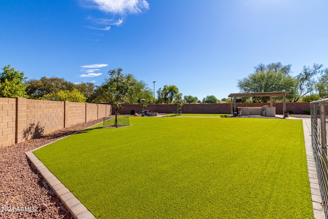 view of yard with a patio and a pergola