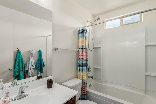 full bathroom featuring toilet, vanity, and shower / bathtub combination with curtain