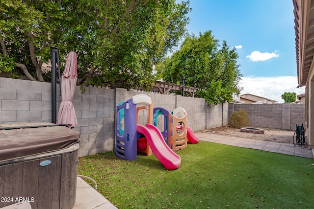 view of play area with a lawn