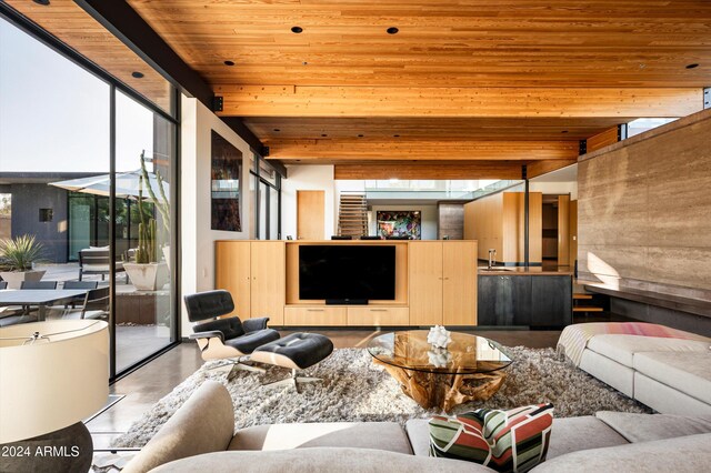 living room with wooden ceiling and sink