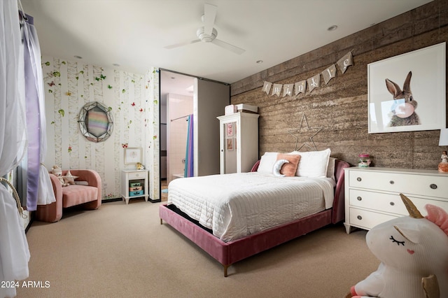 bedroom with ceiling fan and light colored carpet