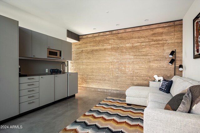 living room featuring sink