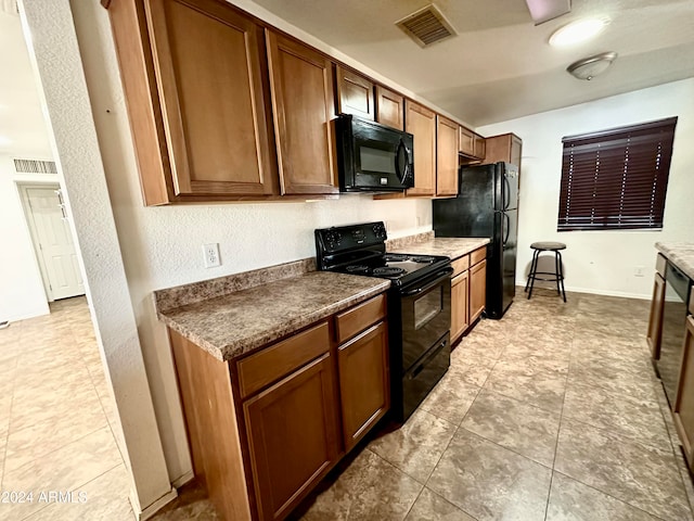 kitchen featuring black appliances