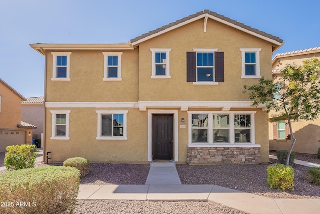 view of front of home featuring stucco siding