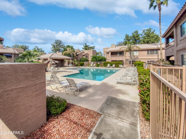 view of swimming pool featuring a patio