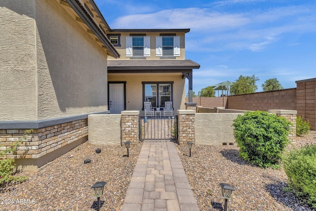 doorway to property featuring a porch