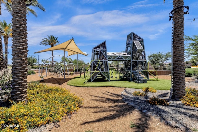 view of jungle gym with a lawn