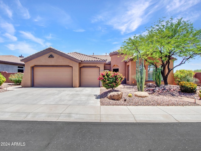 view of front of home with a garage