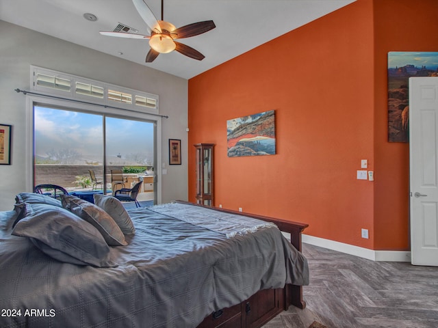 bedroom with access to outside and ceiling fan