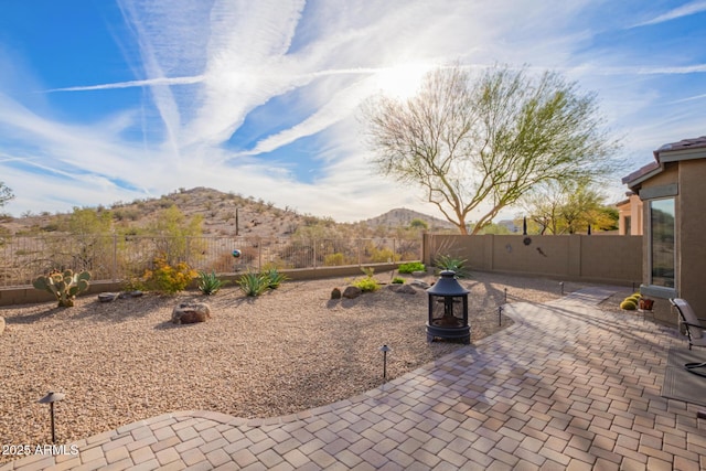 view of patio with a mountain view