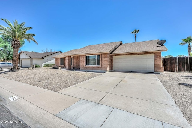 single story home with a garage