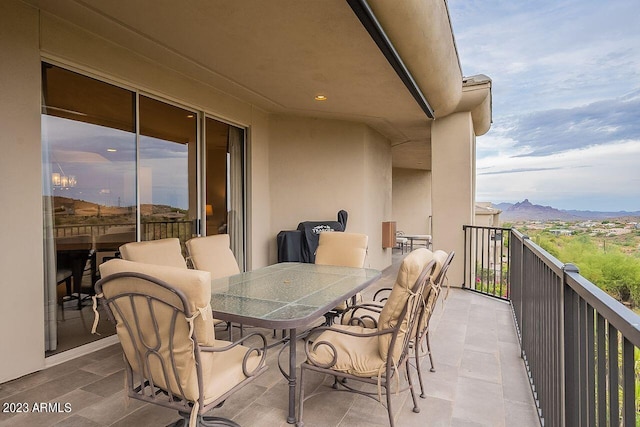 balcony featuring a mountain view