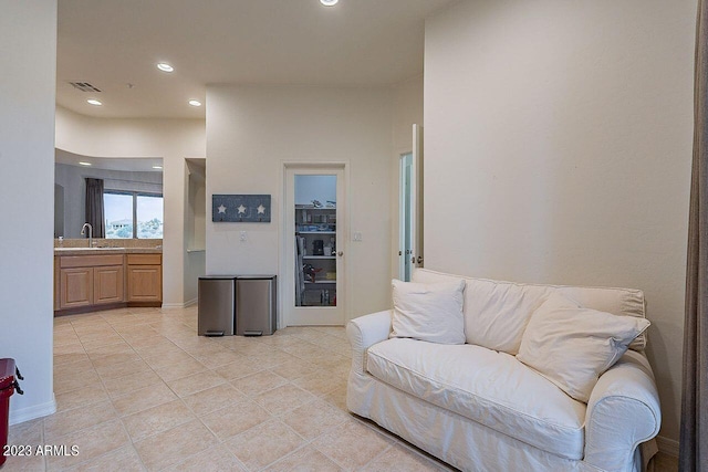 tiled living room with sink