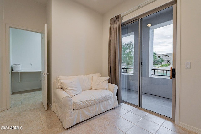 living area with light tile patterned floors