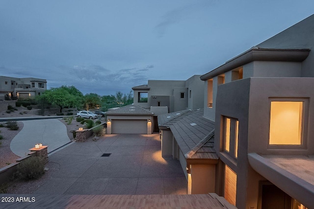 exterior space with a garage