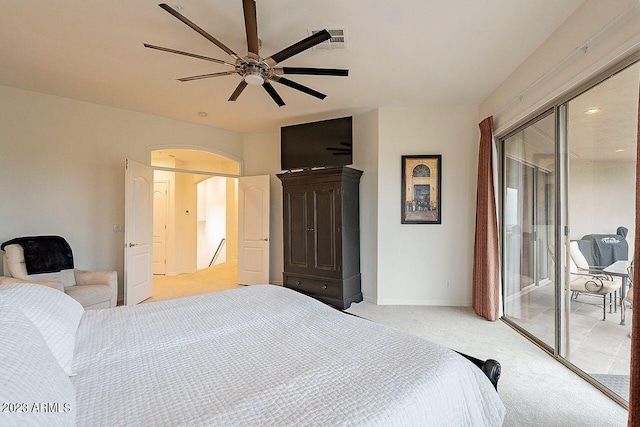 bedroom featuring ceiling fan and light carpet