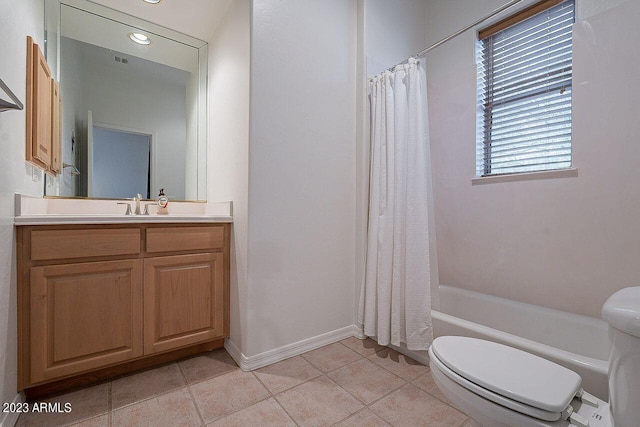 full bathroom featuring vanity, toilet, and shower / tub combo