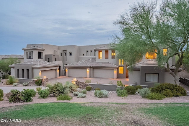 view of front of property with a garage