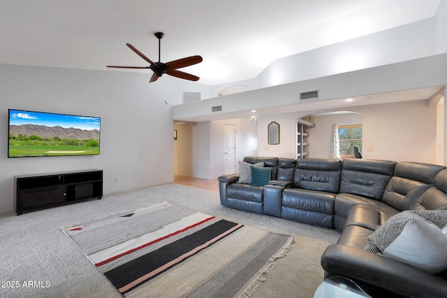 living room featuring light colored carpet, high vaulted ceiling, and ceiling fan