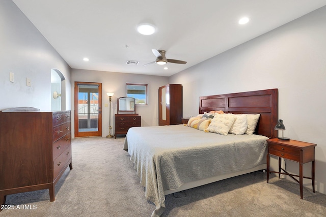 carpeted bedroom featuring access to outside and ceiling fan