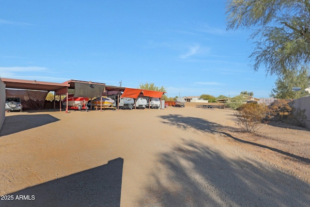 view of yard featuring a carport