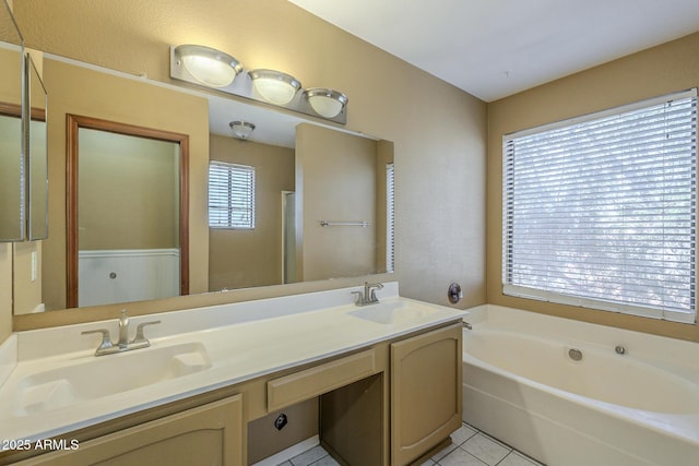 bathroom featuring double vanity, a garden tub, a sink, and tile patterned floors