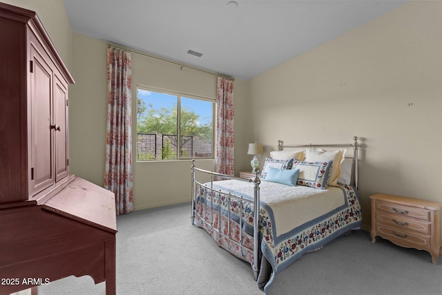 bedroom with light colored carpet, baseboards, and visible vents