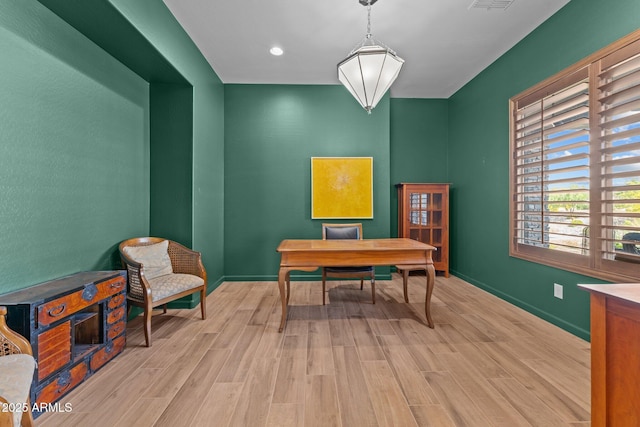 office featuring visible vents, wood finished floors, baseboards, and recessed lighting