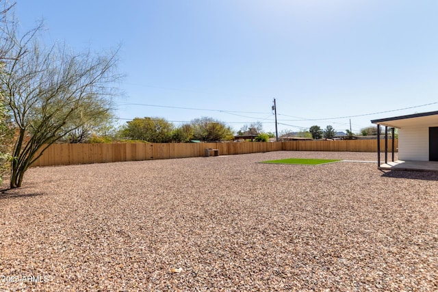 view of yard with a patio and fence private yard