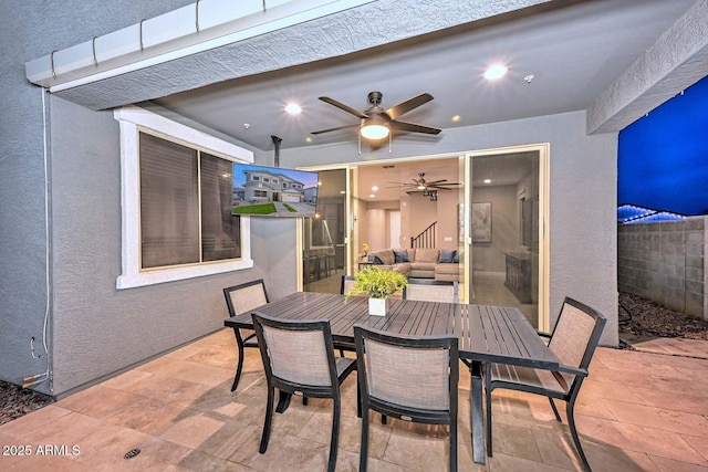 view of patio with ceiling fan