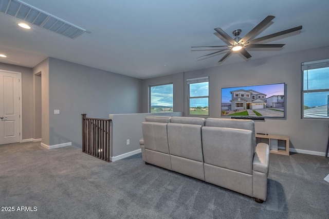 carpeted living room featuring a healthy amount of sunlight