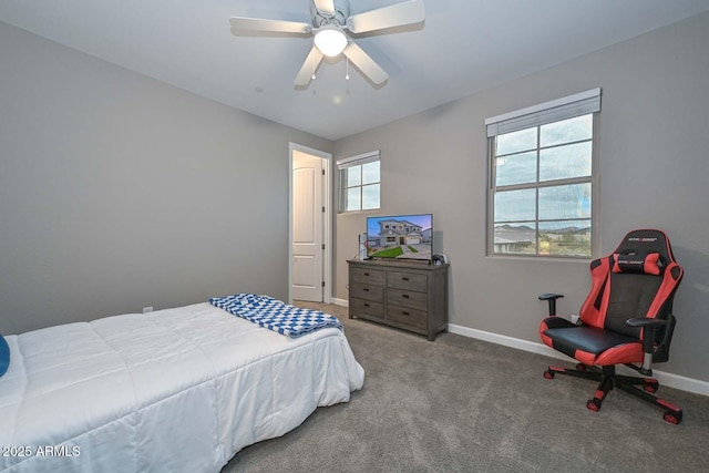 carpeted bedroom featuring ceiling fan