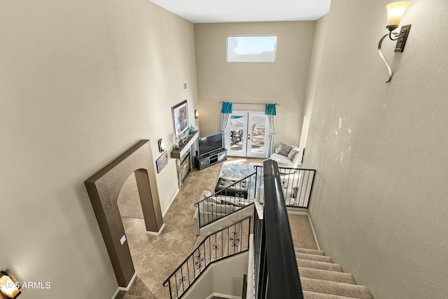 stairway with french doors