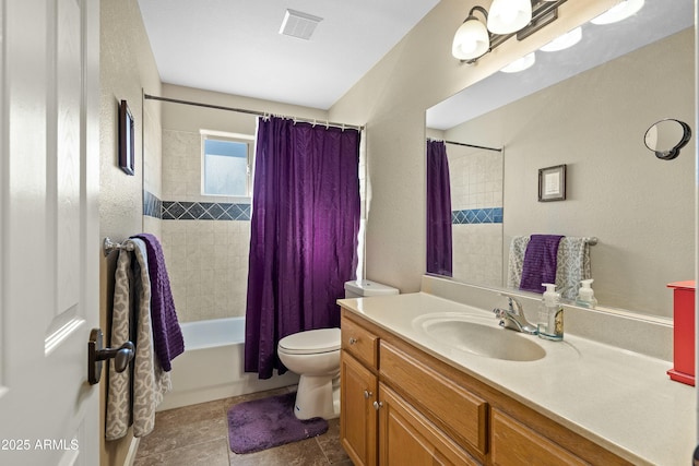 full bathroom featuring toilet, vanity, shower / tub combo, and tile patterned flooring