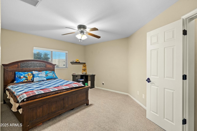 bedroom featuring ceiling fan and light colored carpet