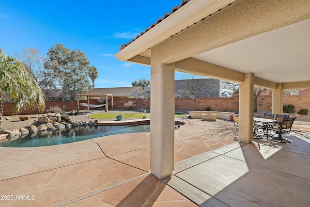 view of pool featuring a patio