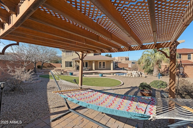 view of patio featuring a pergola