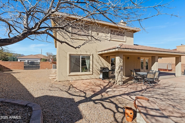 rear view of house with a patio area