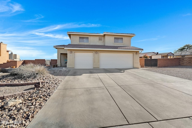 view of front of home featuring a garage