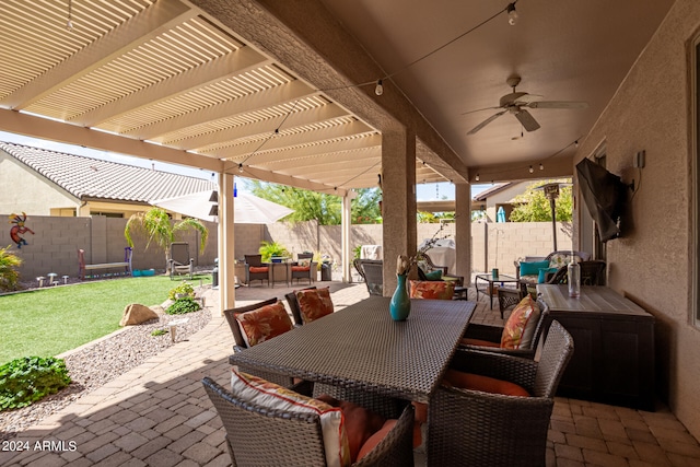 view of patio / terrace featuring a pergola and ceiling fan