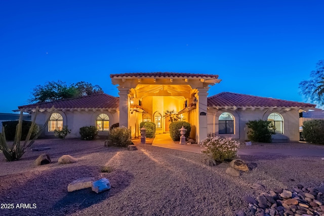 13108 N 76th St, Scottsdale, AZ 85260 - mediterranean / spanish home featuring a tiled roof and stucco siding
