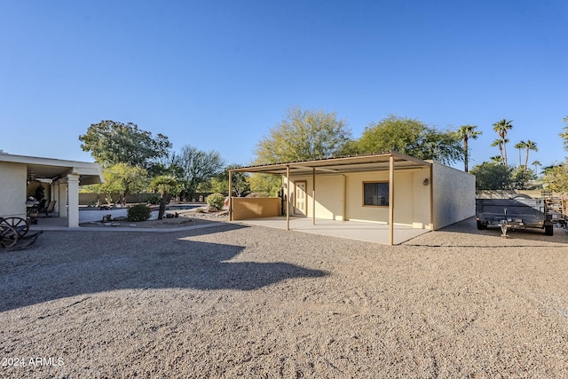 rear view of property with a patio